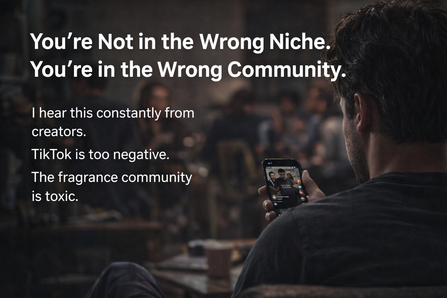 Man looking at TikTok on his phone in a dim room, representing how the platform algorithm shapes what content and communities a user sees.